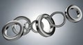 Dynamic Abstract Metallic Rings on Grey Background Royalty Free Stock Photo