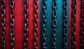 A Striking Display of Black Chains Against a Vibrant Red and Blue Wall