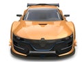 Striking gold leaf painted super car - front view closeup shot Royalty Free Stock Photo