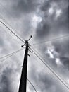 Tangled Wires Beneath a Stormy Sky Royalty Free Stock Photo