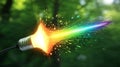 A light bulb exploding with a vibrant spectrum of rainbow colors into a green background Royalty Free Stock Photo