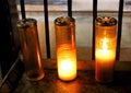 Series of votive candles in a church