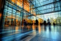 A striking image of a large office building, with a motion blur effect capturing the busy flow of