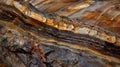 A striking image of a vast open pit mine that seems to stretch on endlessly. The magnitude of the impact on the land is