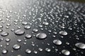 Water Drops on Black Surface Royalty Free Stock Photo