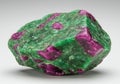 Rough ruby and zoisite crystal specimen with vibrant pink and green hues Royalty Free Stock Photo