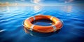 A Striking Orange Life Preserver Floats Tranquilly on a MirrorLike Blue Water Surface A Surreal and Peaceful Visual Royalty Free Stock Photo