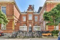 Historic Red Brick Building with Bicycle Park Royalty Free Stock Photo