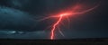 Striking red lightning bolt illuminates the dark sky Royalty Free Stock Photo