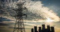Silhouette of power lines and transmission tower against dramatic cloudy sky and city construction electricity Royalty Free Stock Photo