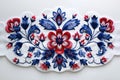 Striking Slovak folk embroidery in red and blue hues