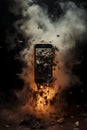 Exploding cellphone on fire - smoke Royalty Free Stock Photo