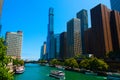 Striking view of Chicago city skyscrapers towering over an urban river