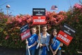 Three Writers Guild of America strikers in Hollywood