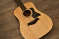 12-string acoustic guitar on a wooden floor Royalty Free Stock Photo