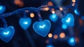 A string of blue lights with hearts on them Royalty Free Stock Photo
