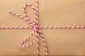 String bow against brown paper Royalty Free Stock Photo
