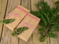 String and brown paper parcels decorated with conifer Royalty Free Stock Photo