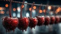On a string, cherries are suspended, bespeckled with miniature water droplets Royalty Free Stock Photo