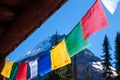 Colorful backlit Himalayan prayer flags