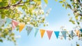 string of colorful pennant against blue sky in the garden Royalty Free Stock Photo