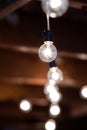 String of Hanging Lights indoors at a wedding