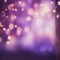 string lights dangling from a tree with a soft purple bokeh background for a festive atmosphere