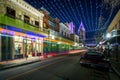 String lights hung over Dauphin Street, and buildings in downtown Mobile, Alabama