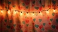 String lights illuminate heart patterned fabric Royalty Free Stock Photo