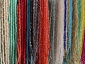 String of necklaces, colorful beads, beautiful plastic beaded jewelry Royalty Free Stock Photo