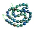 String from polished azurite with malachite balls Royalty Free Stock Photo