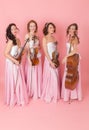 String quartet on a pink background Royalty Free Stock Photo