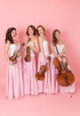 String quartet on a pink background Royalty Free Stock Photo