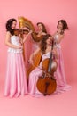 String quartet on a pink background Royalty Free Stock Photo