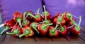 String of red peppers ready to dry Royalty Free Stock Photo