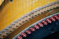 String tension mechanism in an old retro piano. Sound technology. Shallow depth of field