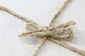 String tied in a bow brown recycled paper Royalty Free Stock Photo