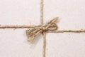 on String tied in a bow brown recycled paper Royalty Free Stock Photo