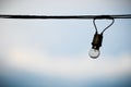 String wired of bulb on blue sky background