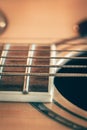 Strings on a classical acoustic guitar, macro shot. Royalty Free Stock Photo