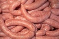 Strings of raw sausages. Ready to sales.