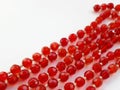 Red glass beads on white