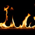 Strip of fire on a black background Royalty Free Stock Photo
