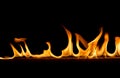 Strip of fire on a black background Royalty Free Stock Photo