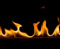 Strip of fire on a black background Royalty Free Stock Photo