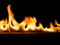 Strip of fire on a black background Royalty Free Stock Photo