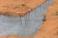 A strip foundation reinforcement frame was constructed on the house's reinforced concrete structure