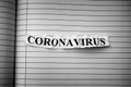 Strip of newspaper with the word Coronavirus typed on it
