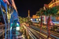 Strip night illumination, palm trees and casino in Las Vegas