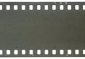 Strip of old celluloid film with dust and scratches